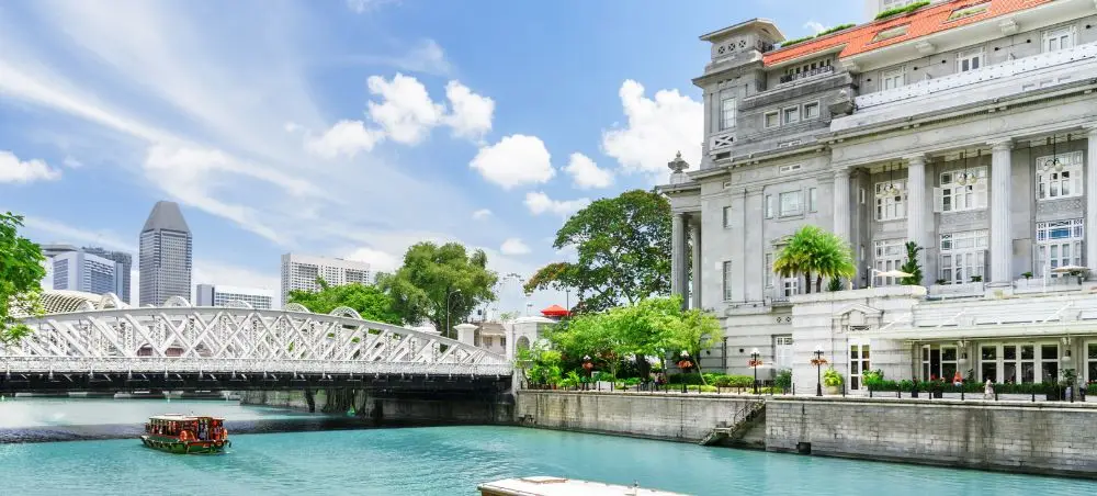 Singapore River waterfront showcasing colonial architecture and modern skyline for luxury travel destinations