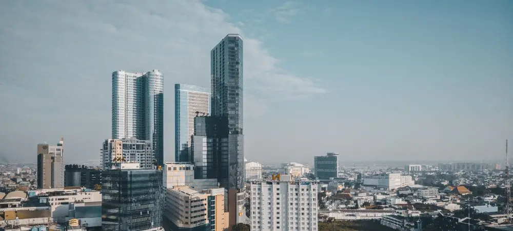 Modern skyscrapers and urban development showcase Surabaya's growing business district and luxury travel appeal