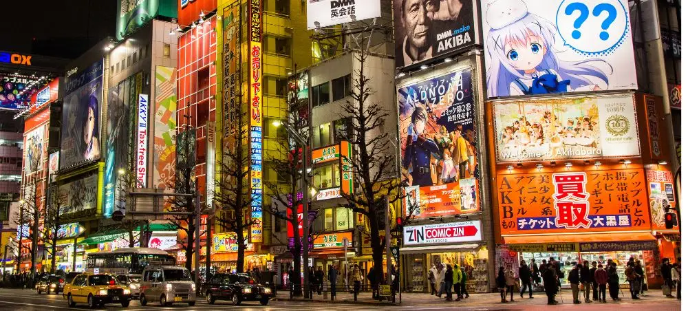 Vibrant neon-lit streets of Tokyo's Akihabara district showcasing Japan's electric urban nightlife scene