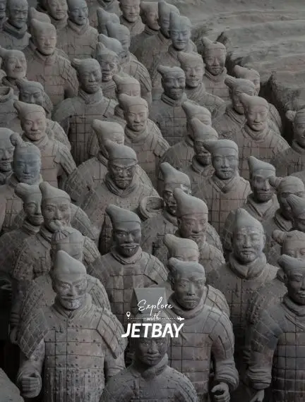 Ancient terracotta warriors standing in formation at Xi'an archaeological site, China's historic destination