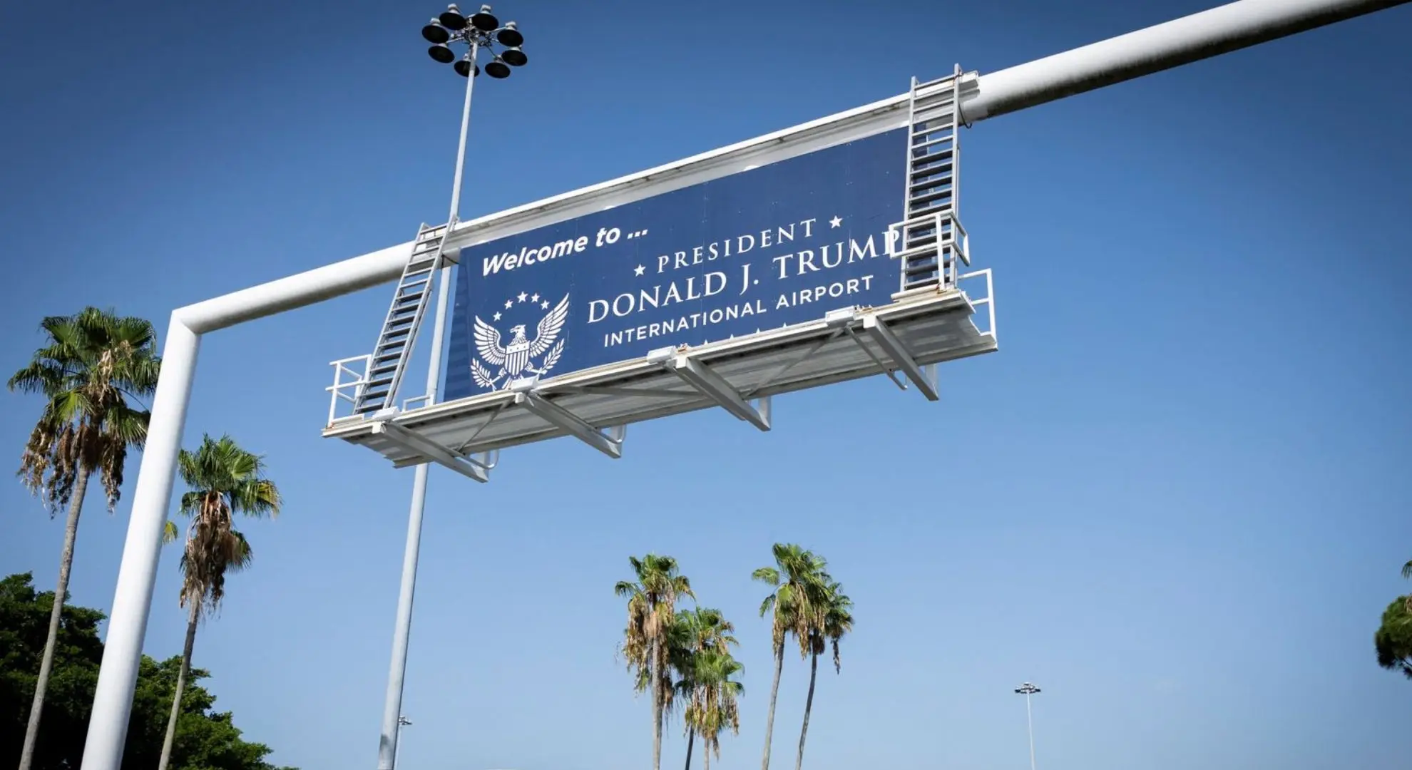 Overhead sign at President Donald J. Trump International Airport in West Palm Beach, Florida