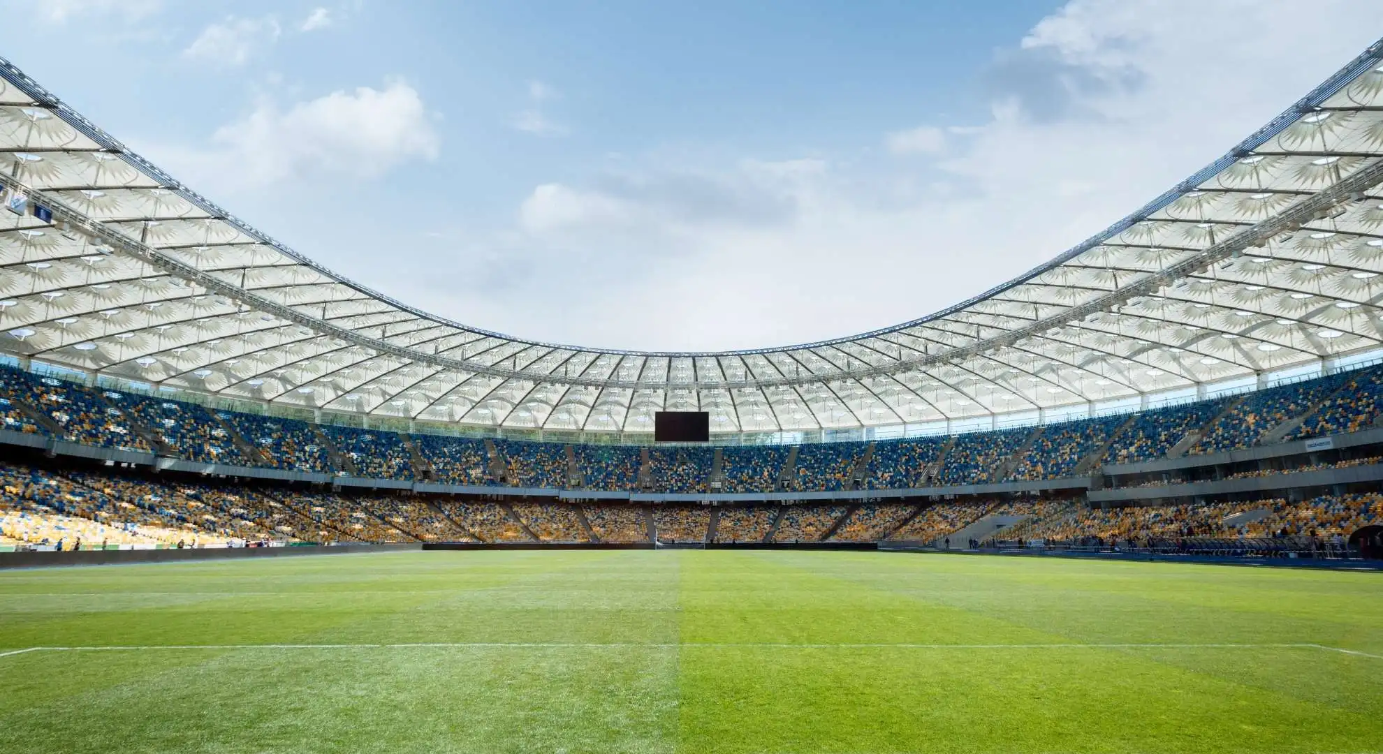 Empty football field, representing World Cup travel